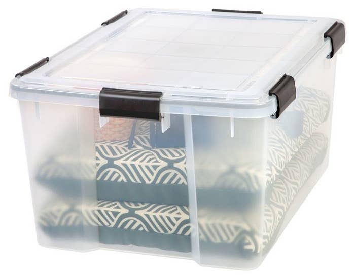 a clear box containing clothes