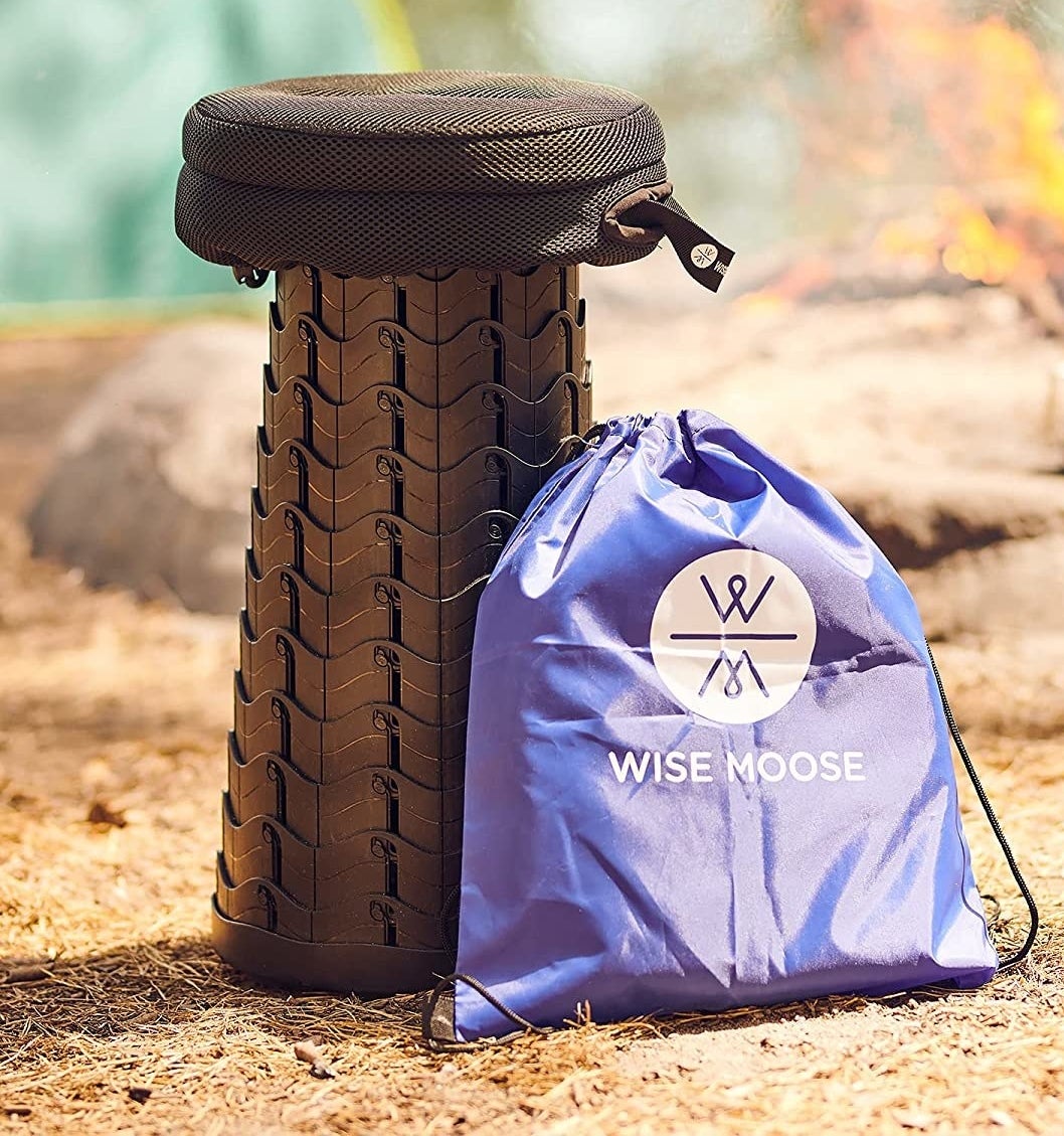 the stool extended next to the bag that it comes with