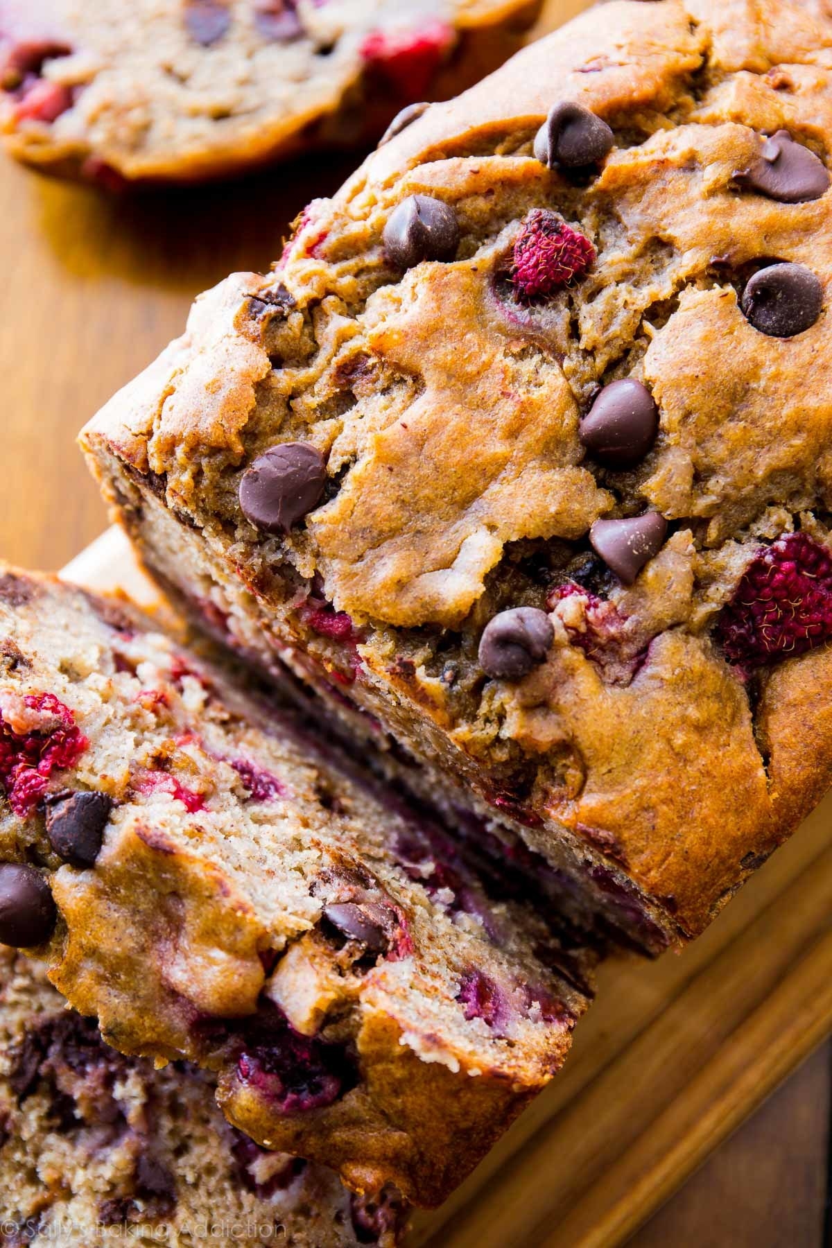 A loaf of raspberry banana bread with chocolate chips.