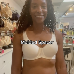 Screenshot of a video by TikTok user @nicolacrookonline of her wearing a molded spacer bra