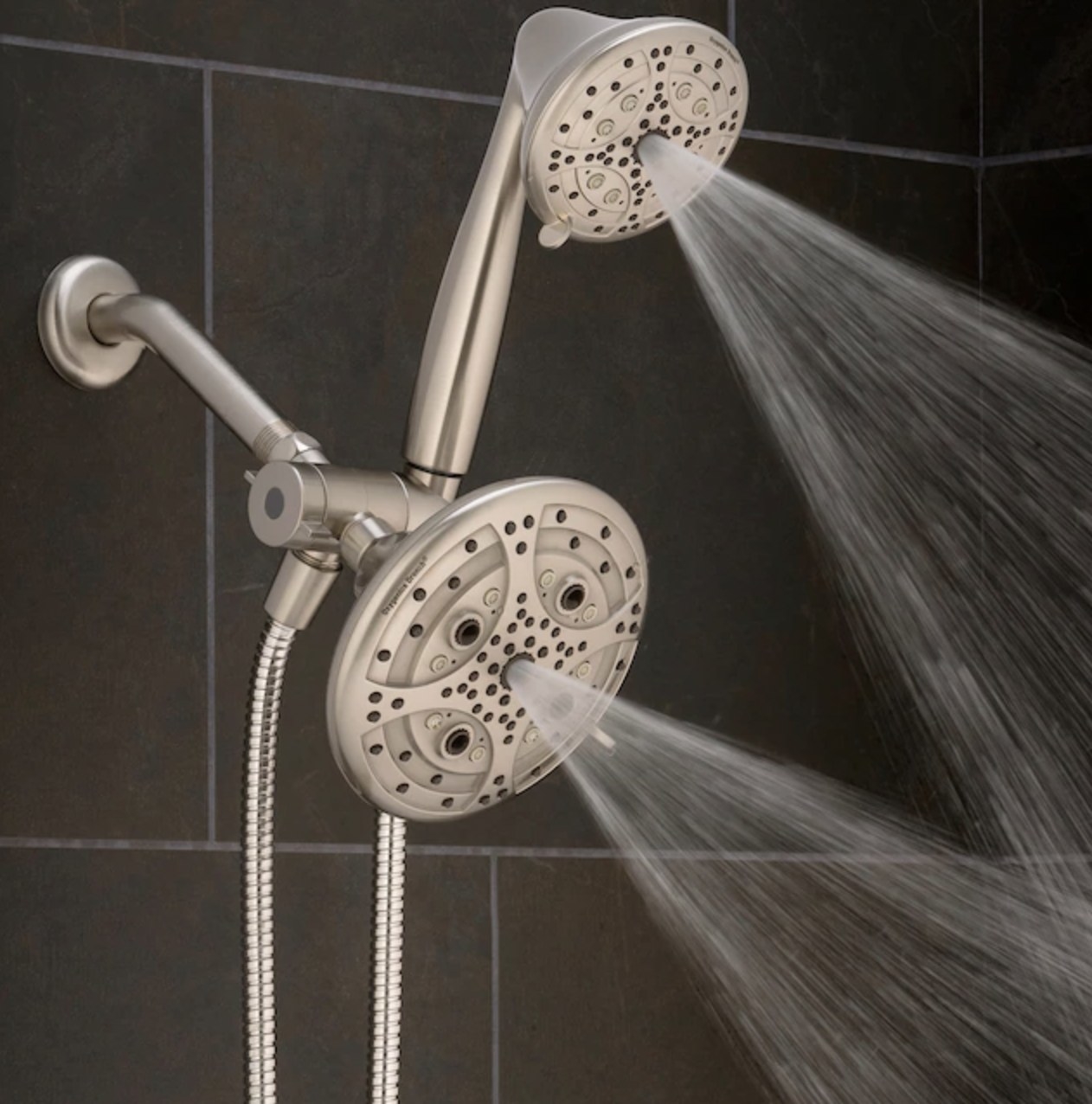 The dual shower head spraying water