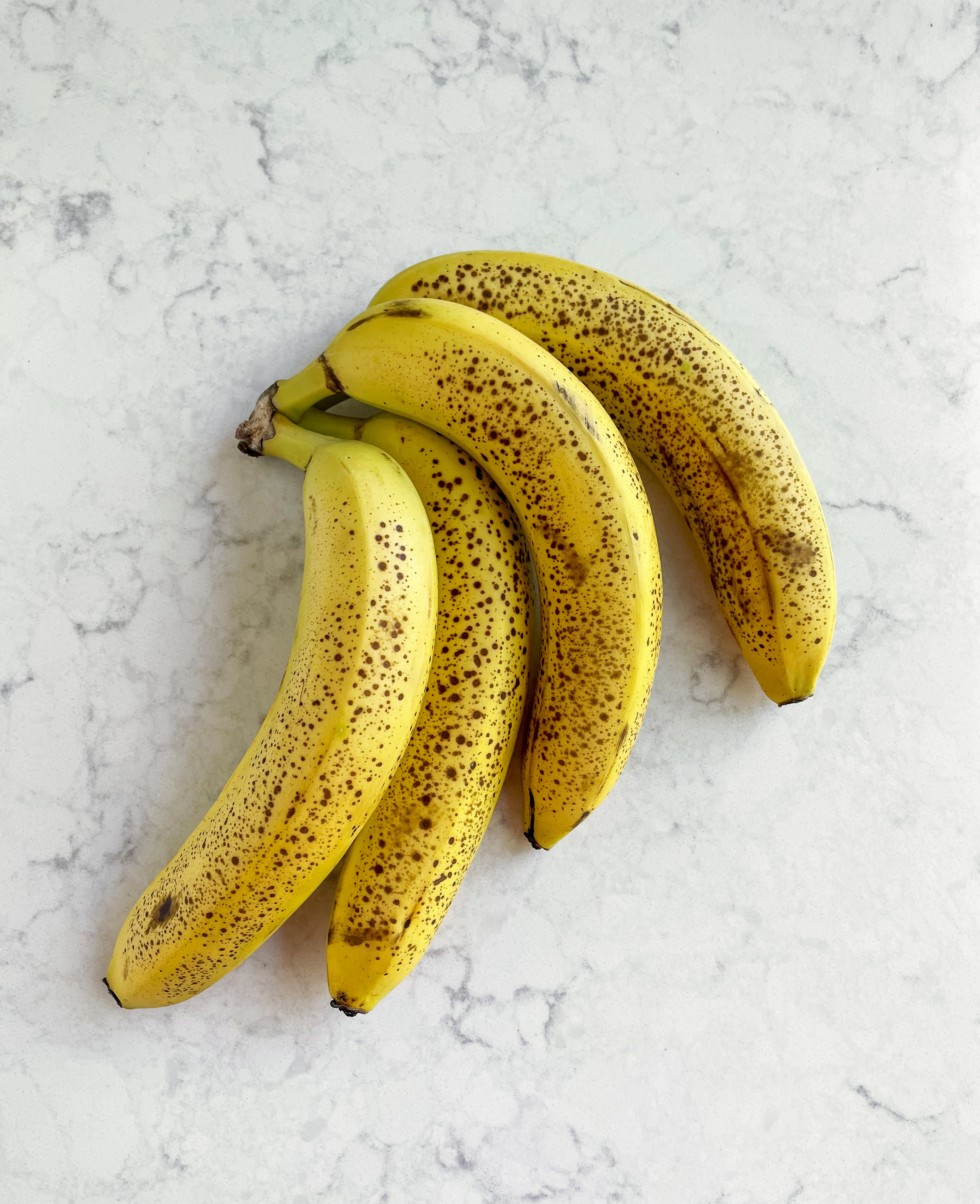 bananas laying on a counter