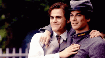 Stefan and Damon happy together in a flashback scene