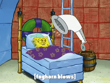 GIF of SpongeBob in bed with a foghorn blowing in &quot;SpongeBob Squarepants&quot;