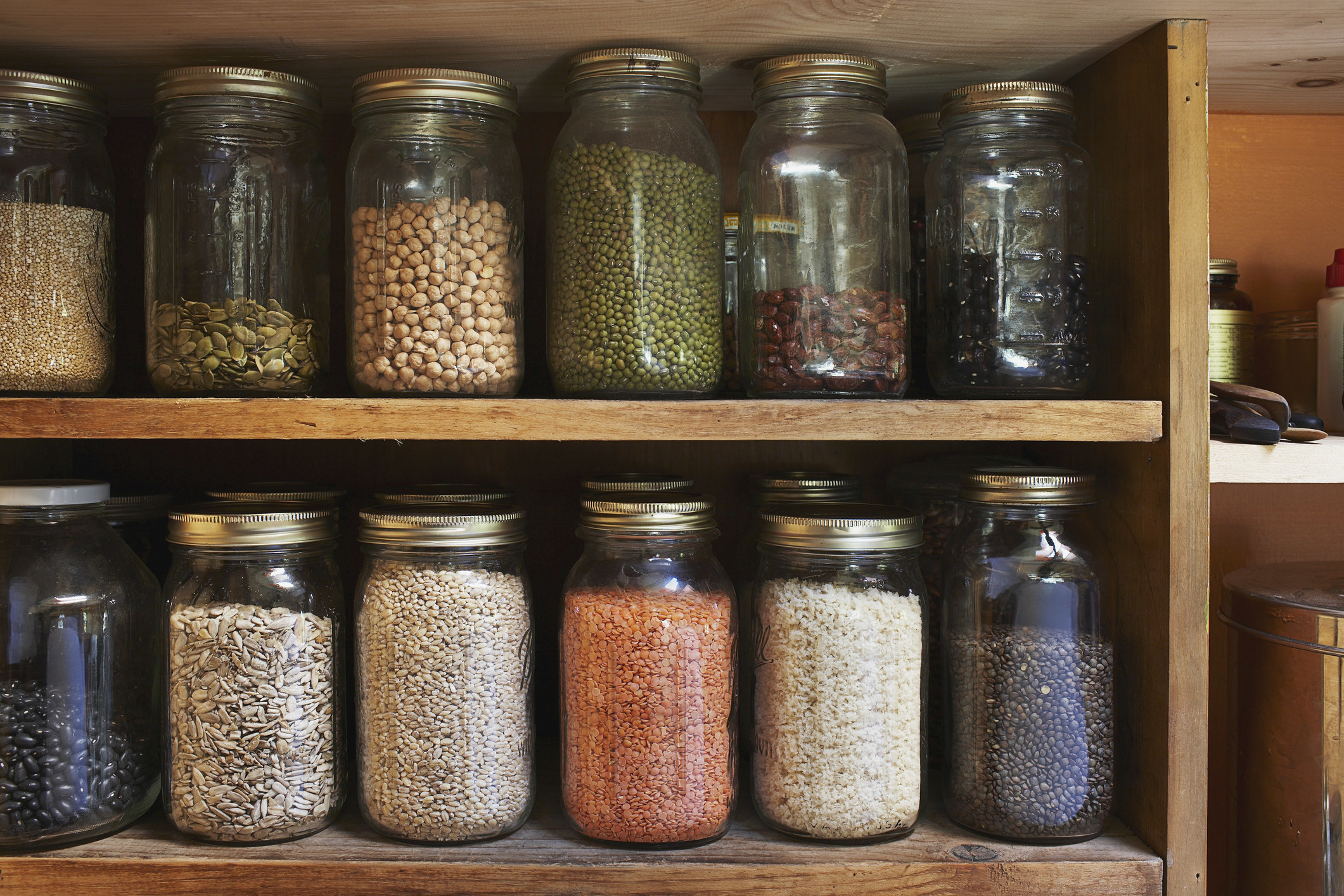 Jars of spices in a cupboard