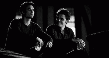 Damon and Stefan sitting together peacefully