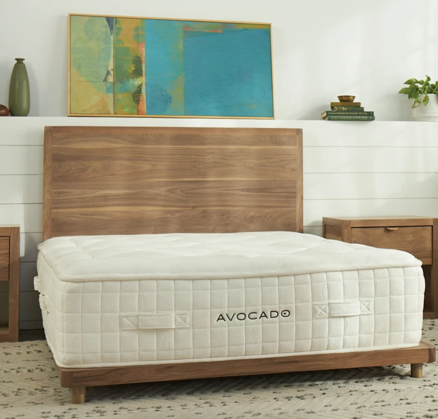 A very big mattress is shown on a bed