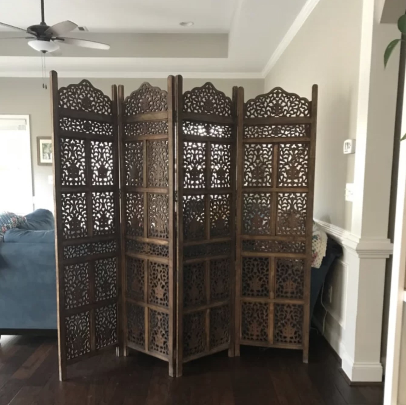 a reviewer photo of the wood room divider