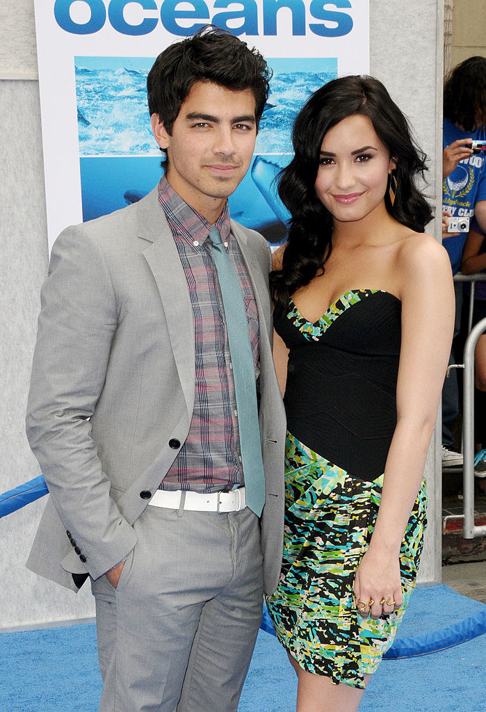joe and demi at an event