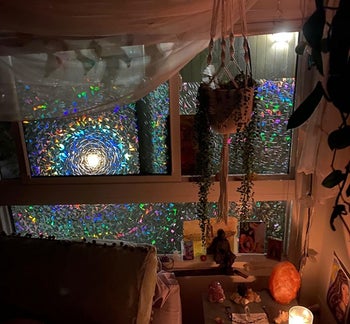 prismatic window film applied to a reviewer's bedroom windows, giving a stained glass looking effect at night