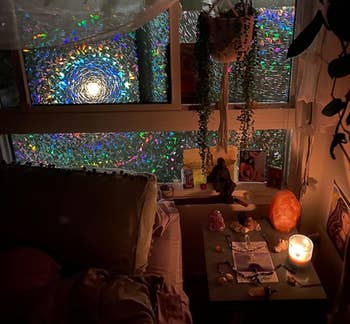 prismatic window film applied to a reviewer's bedroom windows, giving a stained glass looking effect at night