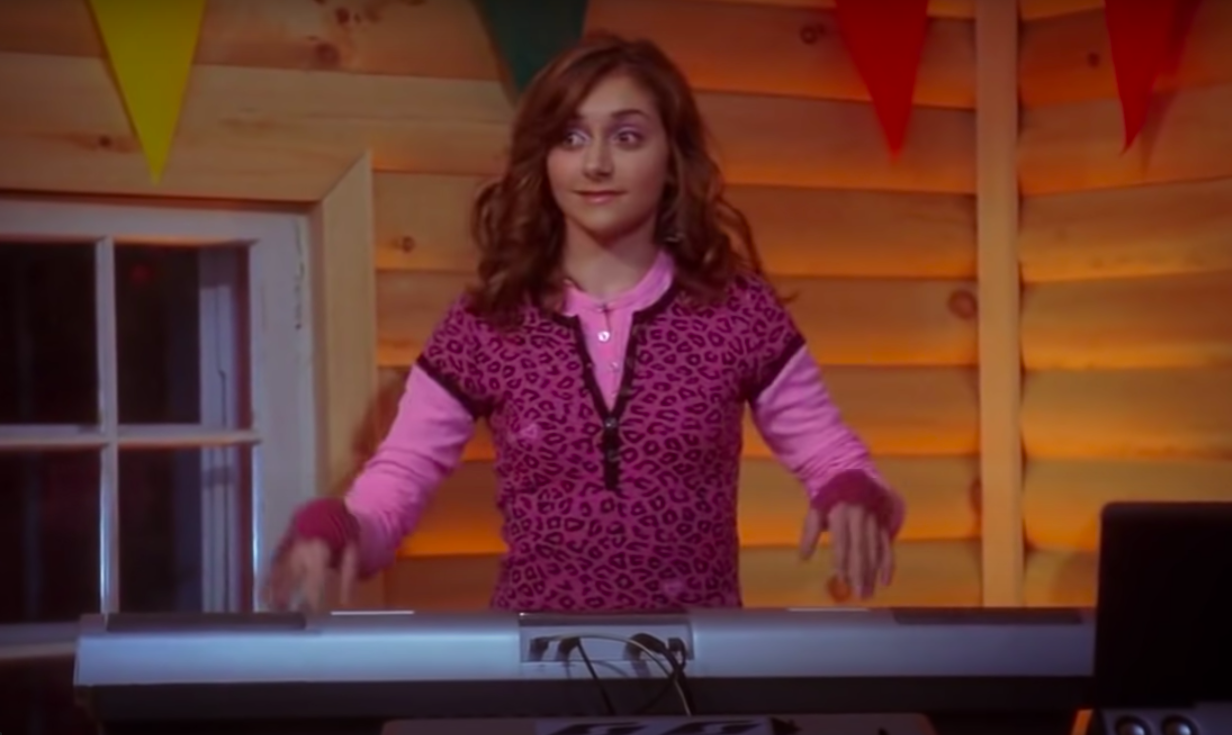close up of alyson&#x27;s character playing the keyboard