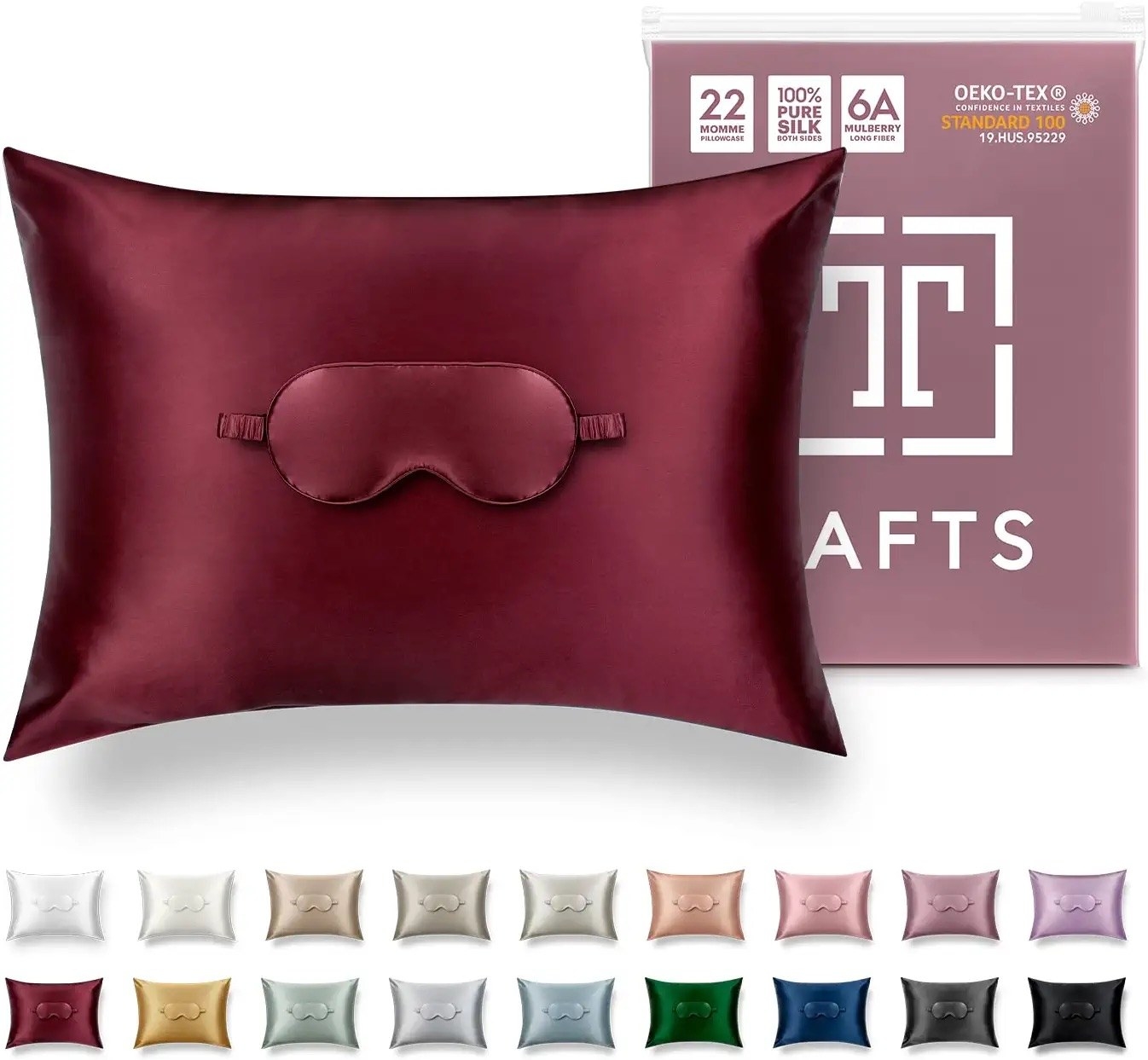 A silk pillowcase and eyemask in a deep red color.