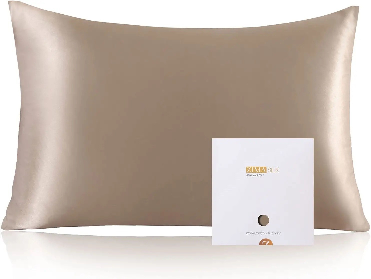 A pillow with a beige silk pillow case