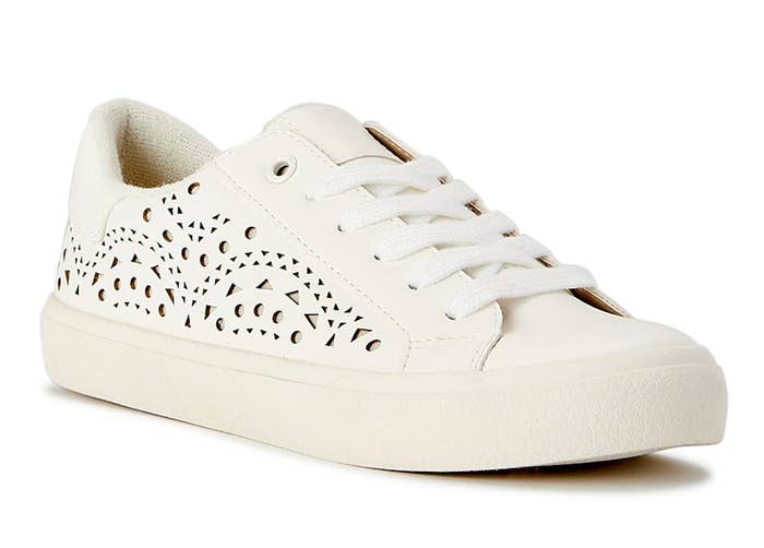 A white sneakers with laser cut detailing