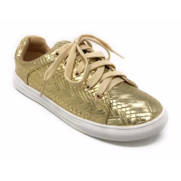 A pair of gold sneakers