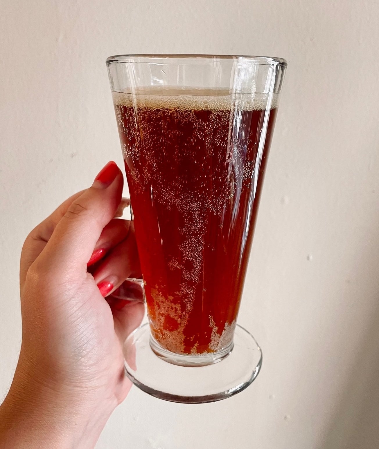 A glass of the brown ale