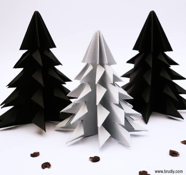 Three black and white paper Xmas trees