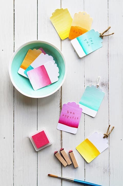 Different-colored gift cards, some with messages