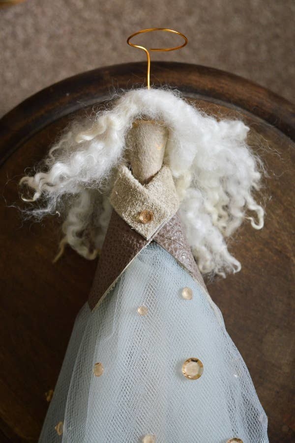Angel tree topper with long cotton hair and long net dress