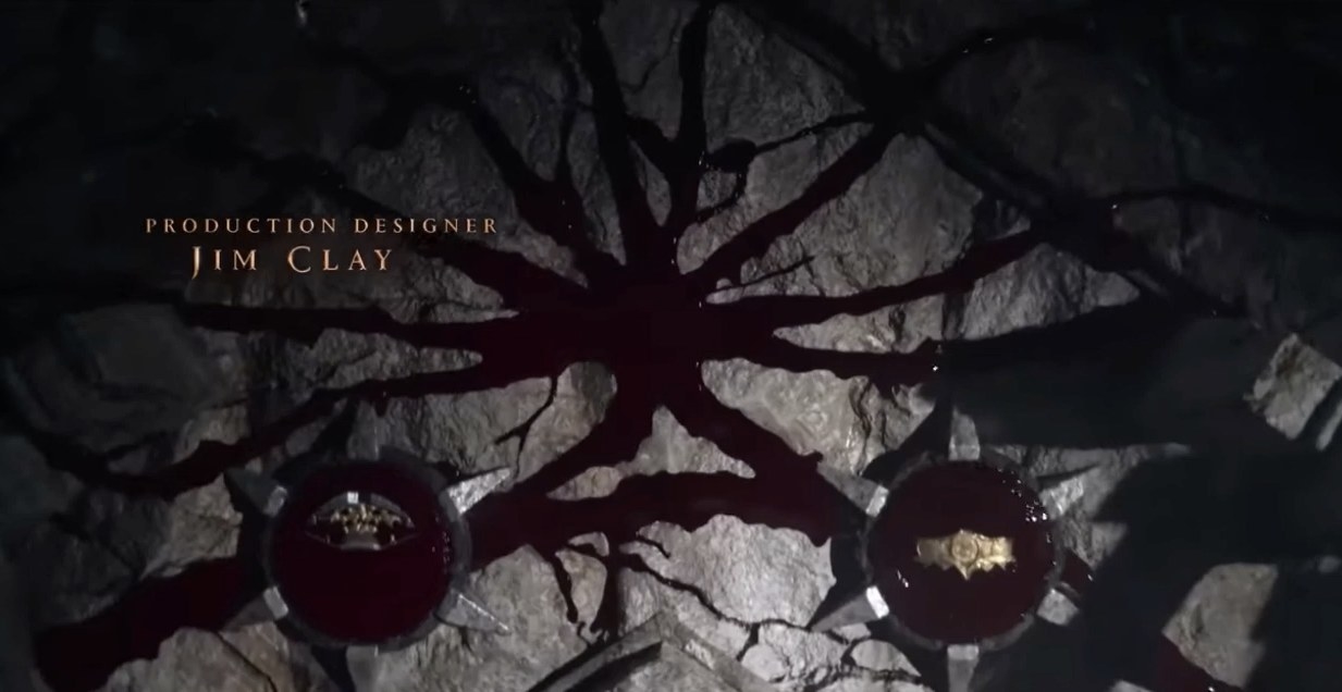 Blood branches off in many different directions from two connected cogs