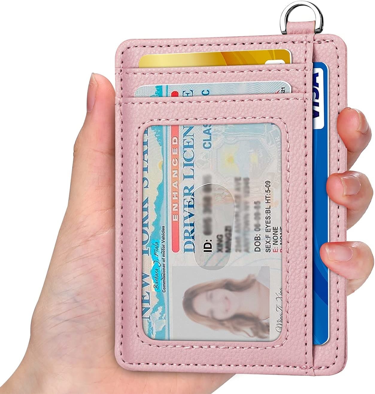 a person holding a card holder on a white background