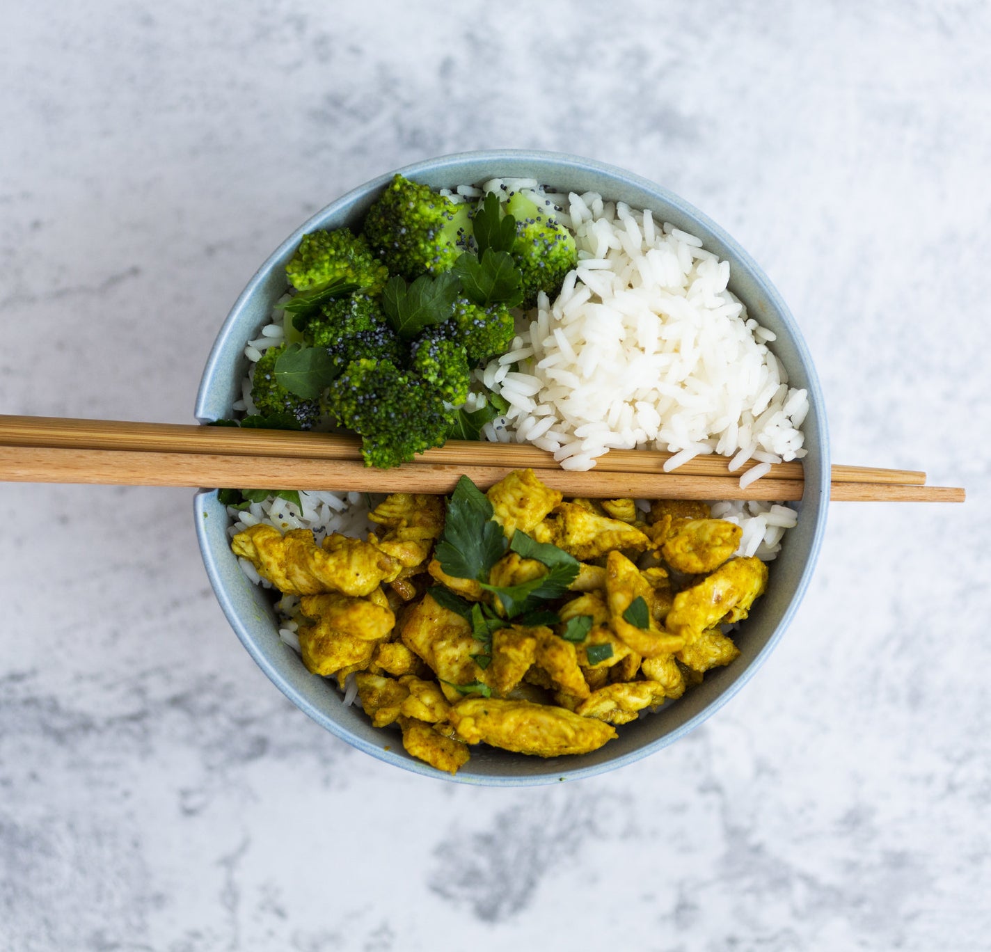 Chicken with rice and broccoli.