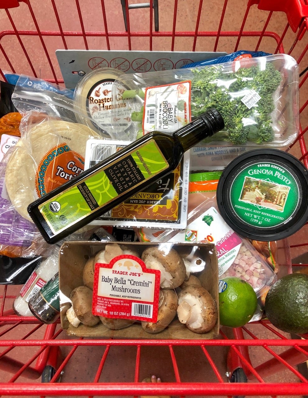 A bunch of groceries in a cart.
