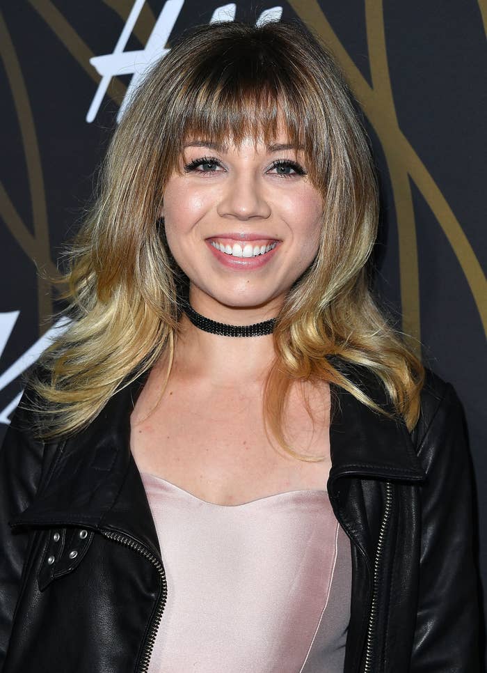 Jennette smiles for a photo