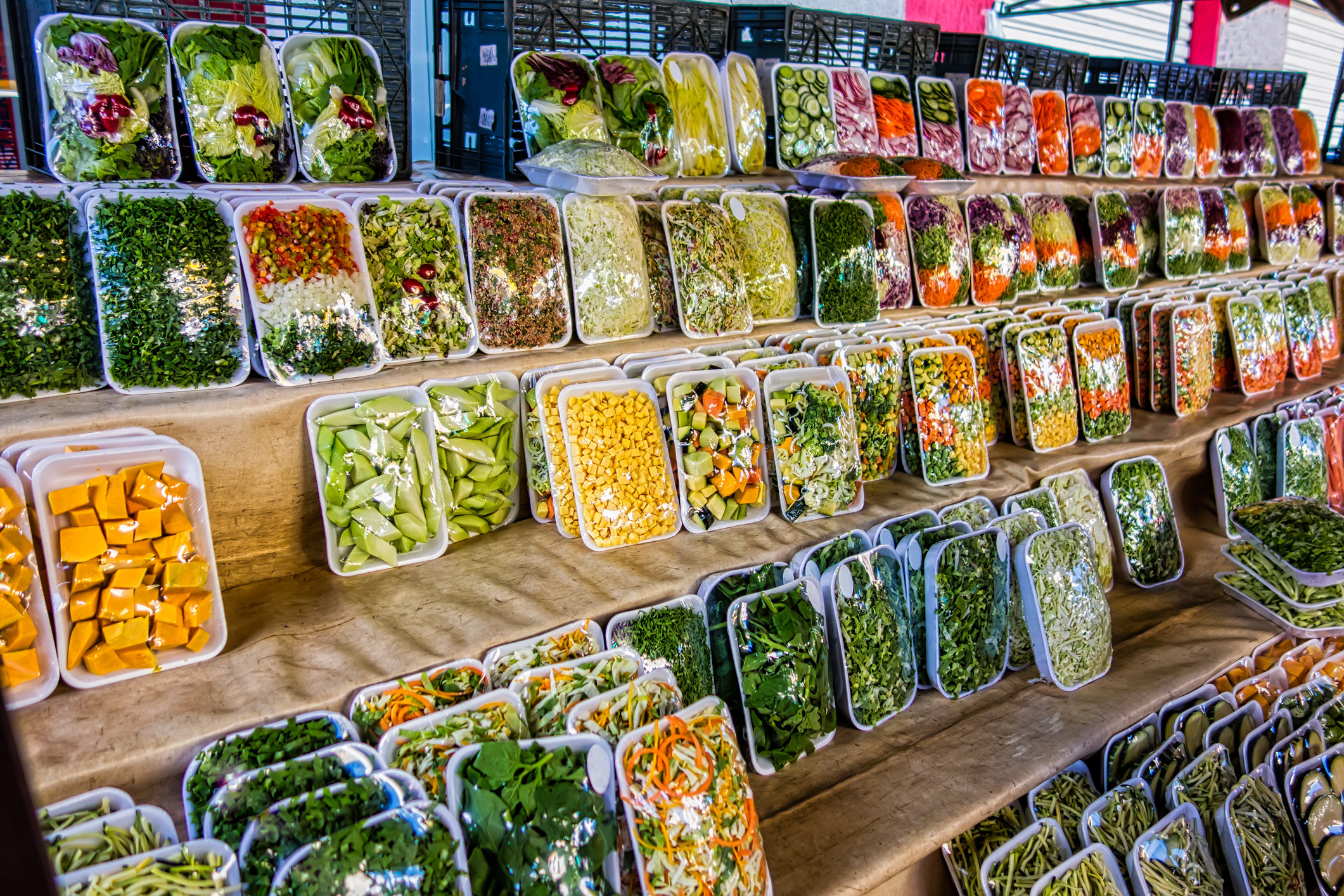 Packaged vegetables at a market.