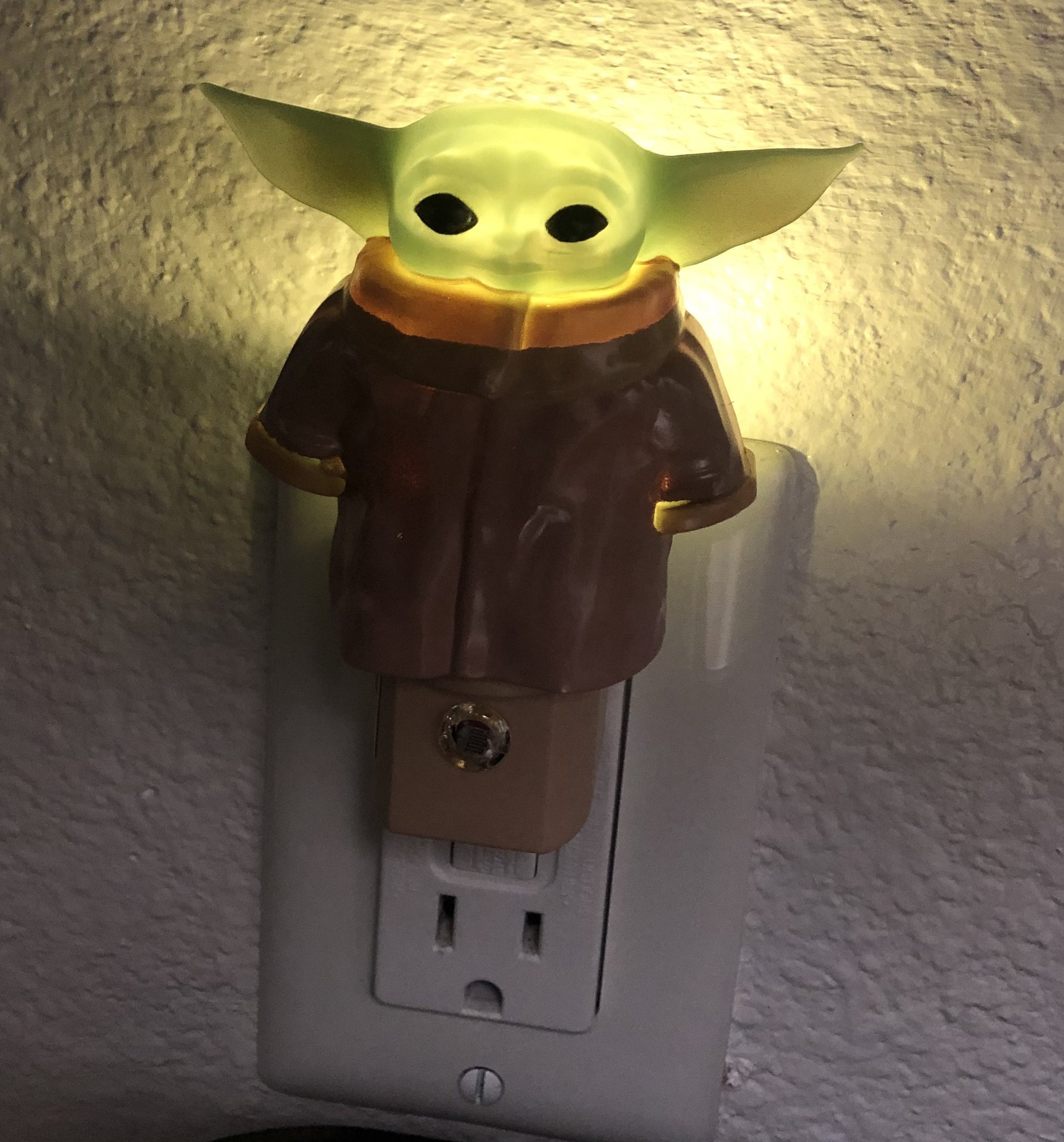 reviewer&#x27;s photo of the Baby Yoda night light