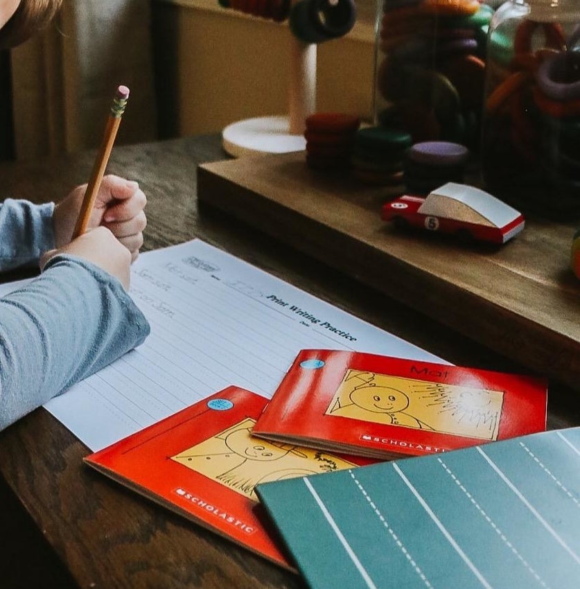reviewer's photo of a kid reading the books