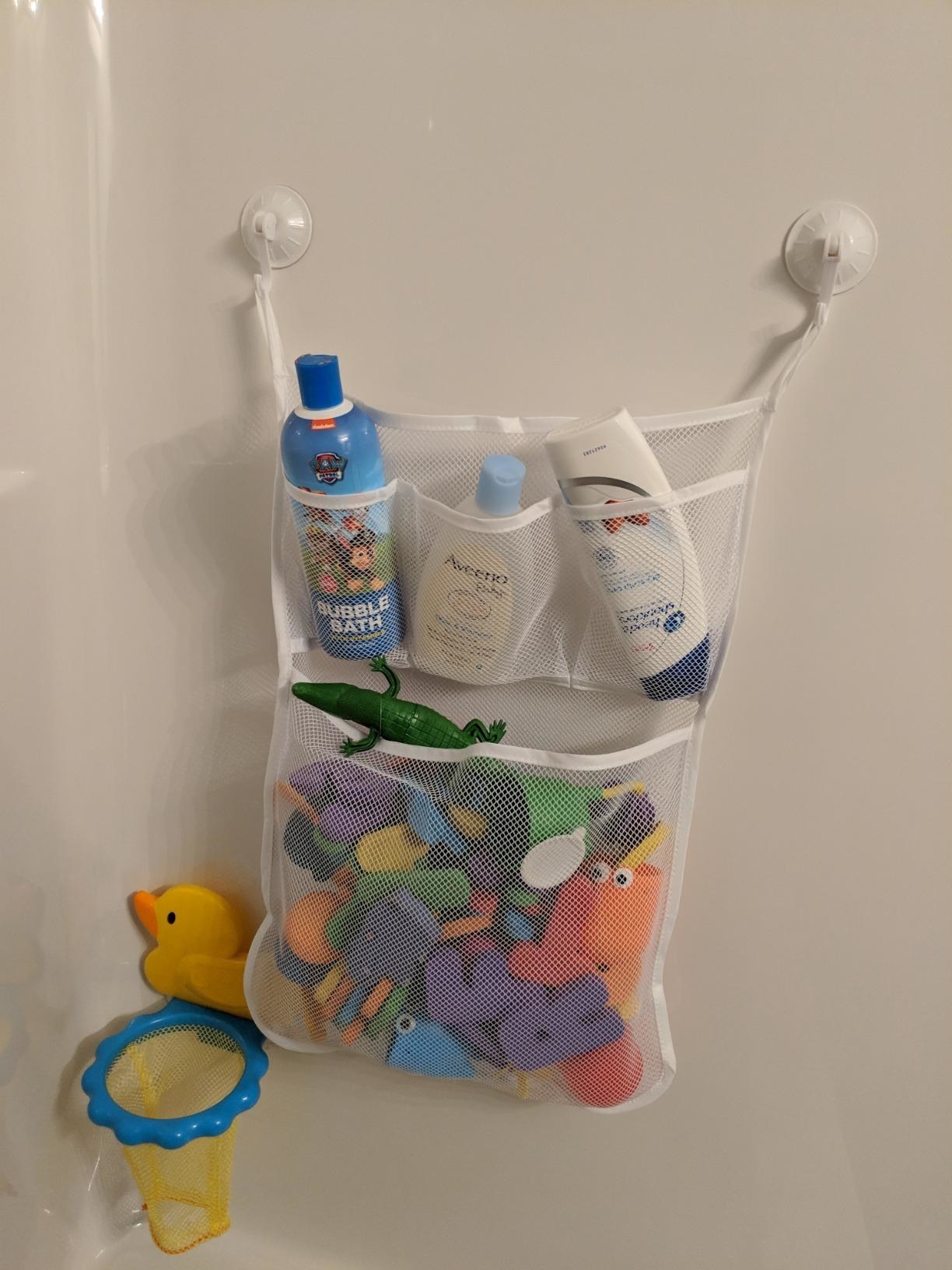 reviewer&#x27;s photo of the bath organizer