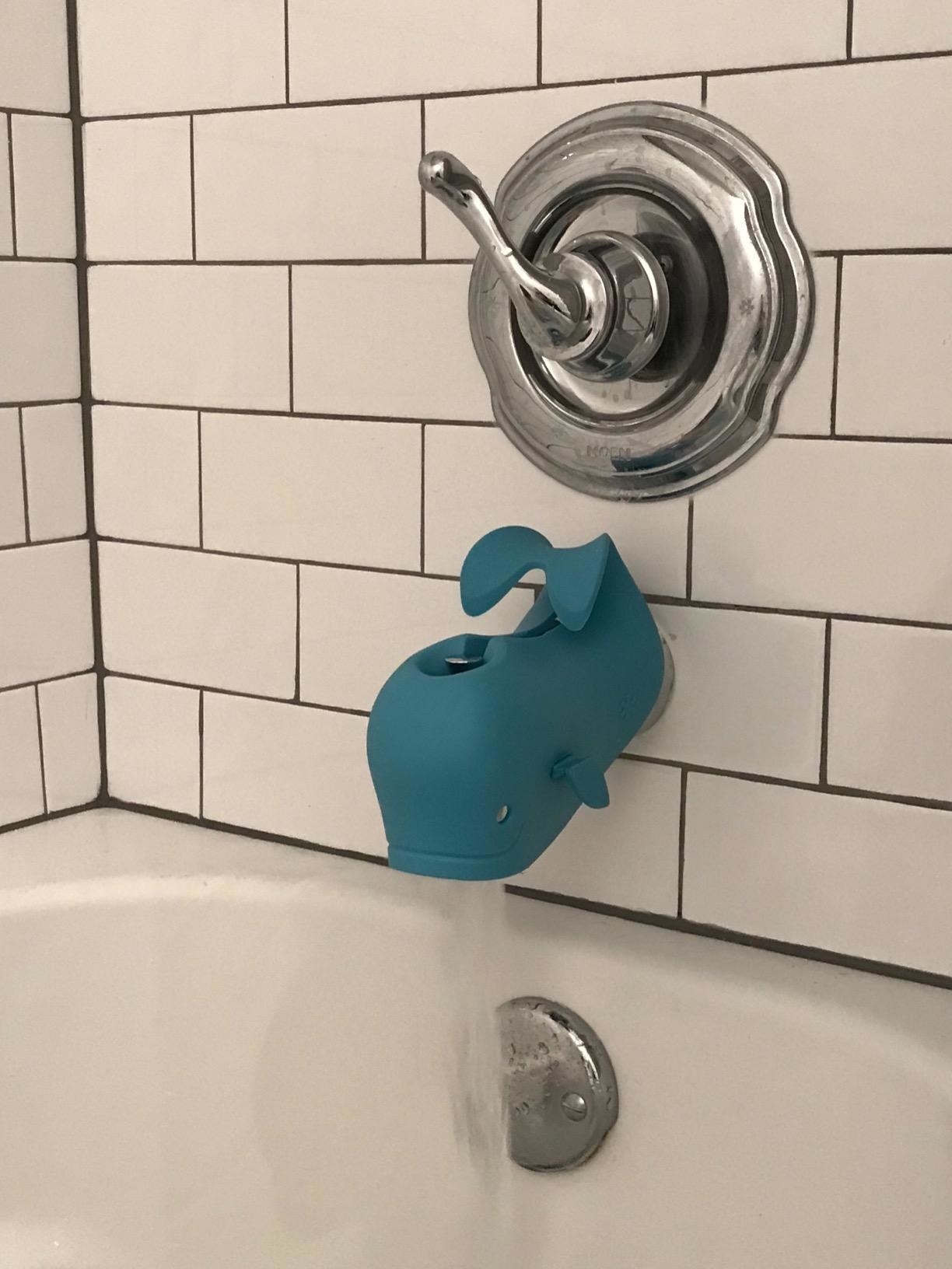 reviewer&#x27;s photo of the bath spout cover