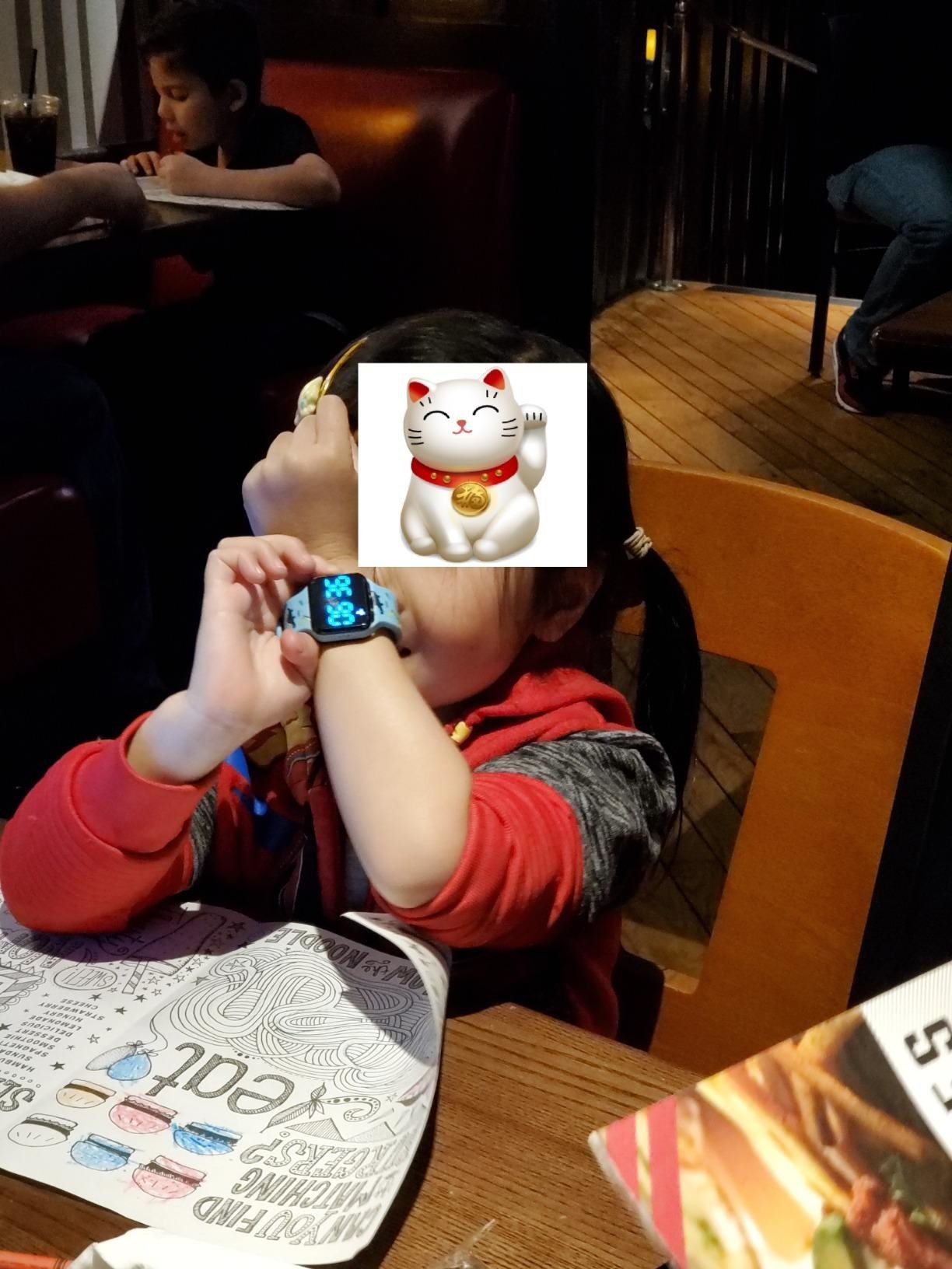 reviewer&#x27;s photo of kid with potty training watch