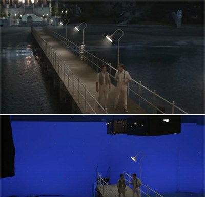 Nick and Gatsby walking on a pier which actually has a blue screen behind it