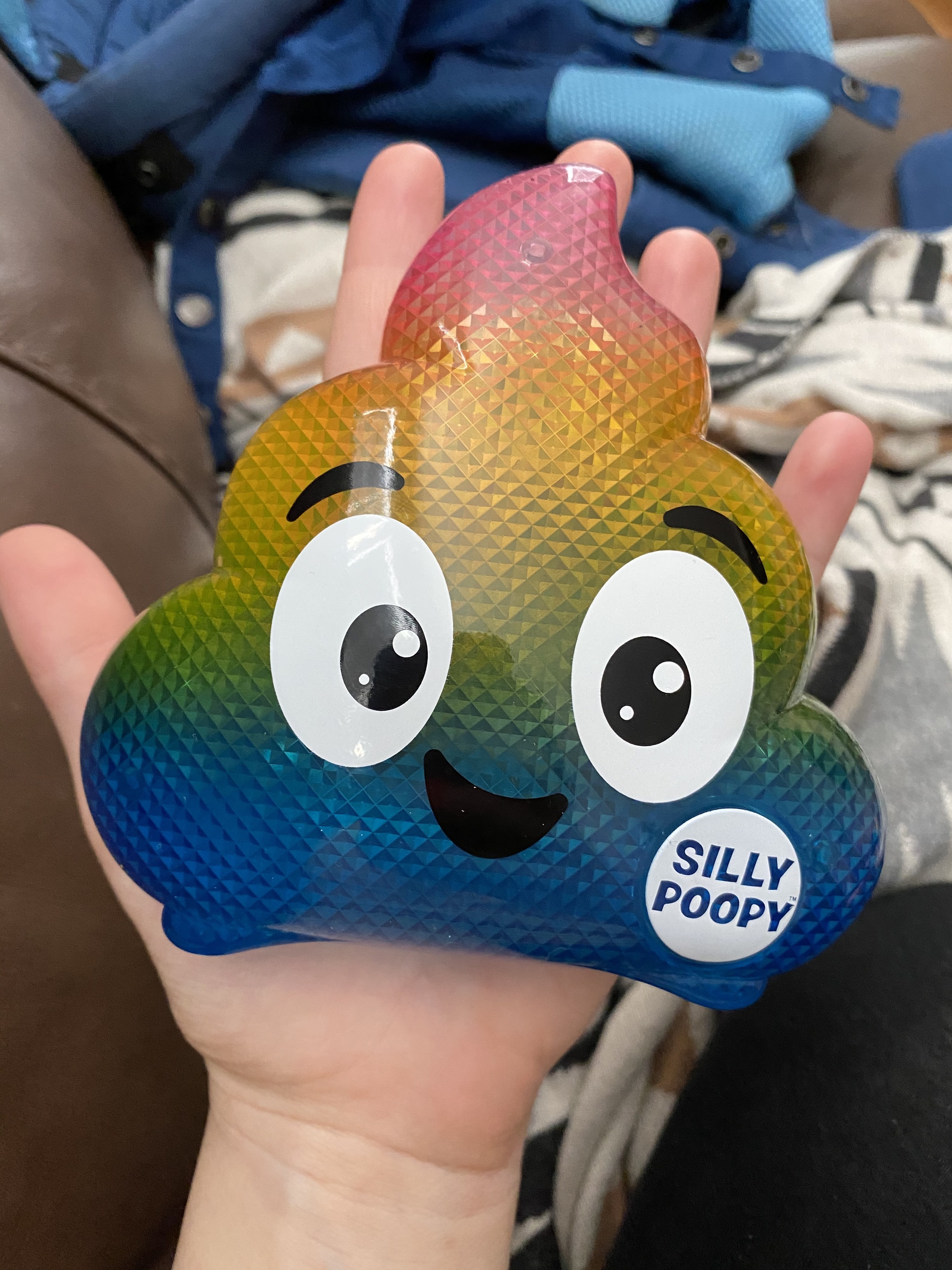 reviewer&#x27;s photo of the rainbow poop toy