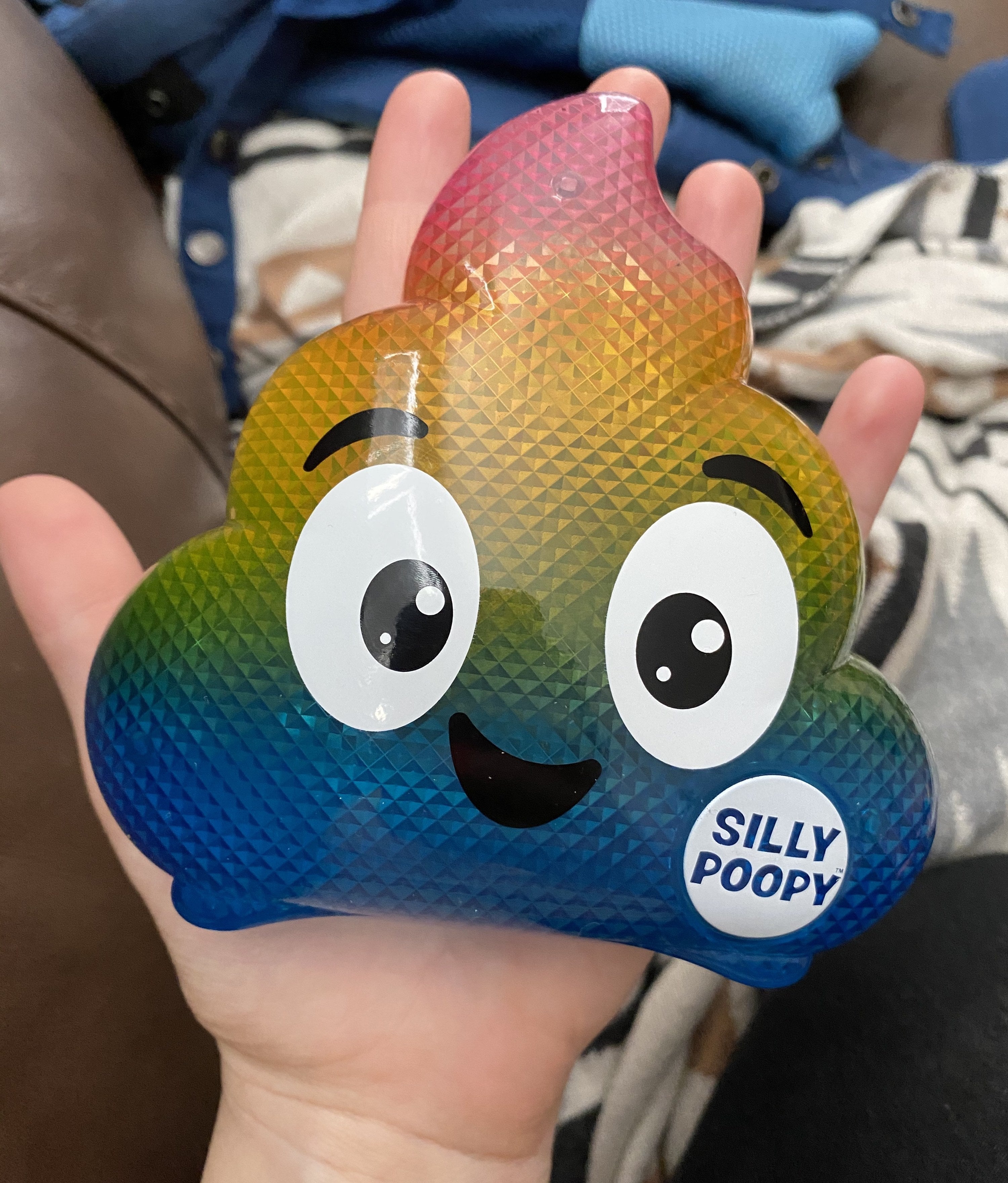reviewer&#x27;s photo of the rainbow poop toy