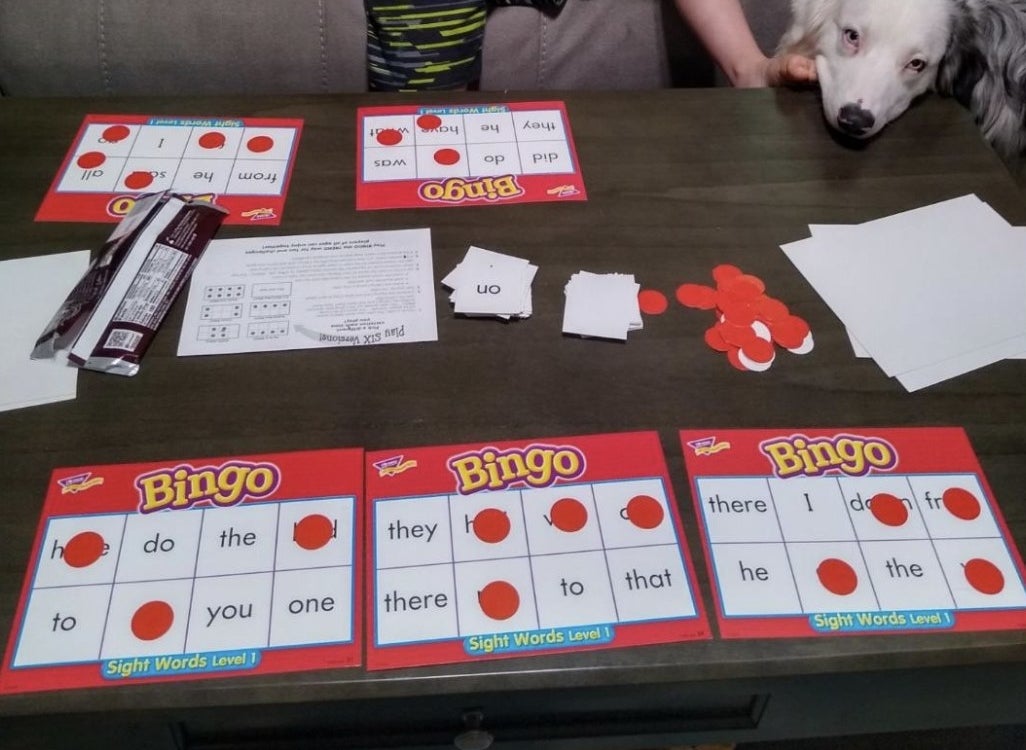 Kid with sight word bingo