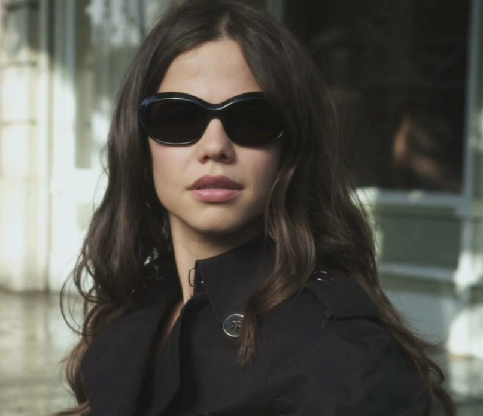 Tammin Sursok, who has dark brown hair and is wearing sunglasses