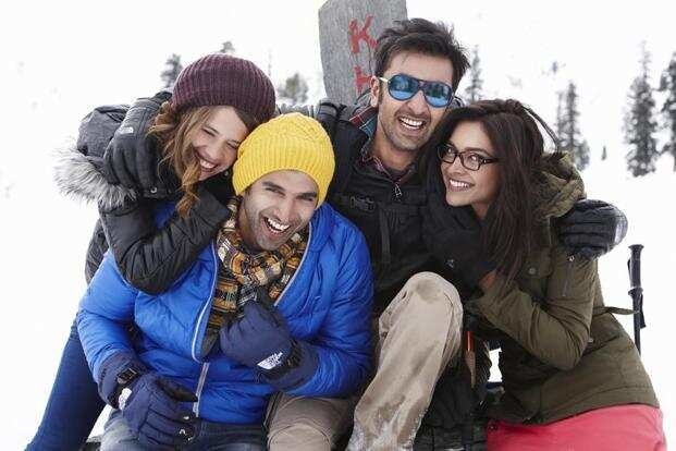 The cast of YJHD hugging and smiling in a still from the movie