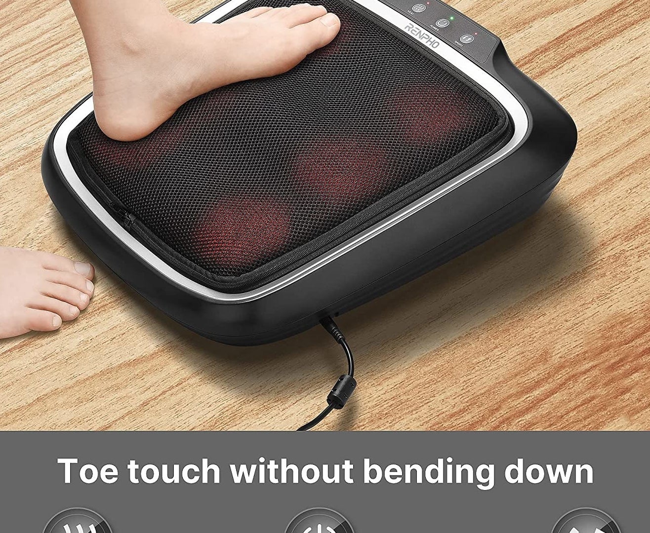 A person putting their foot on the massager