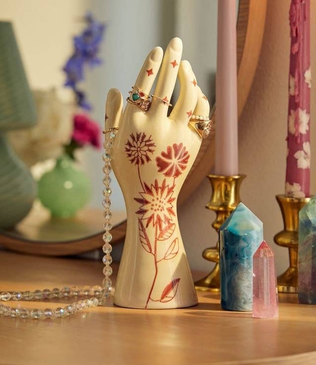 a hand-shaped jewellery stand