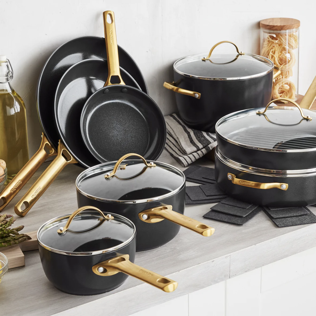 the 16-piece cookware set with pots, pans, and skillets with gold-tone handles