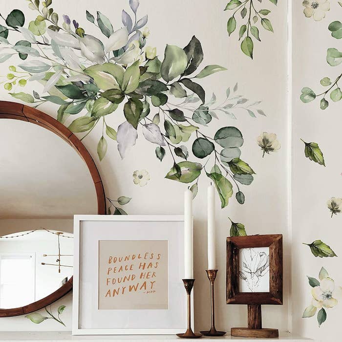 the wall decals over a mirror
