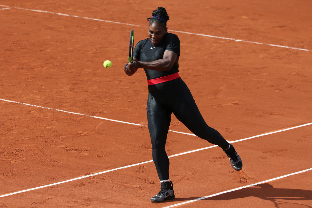 Serena playing a match in a full-body catsuit