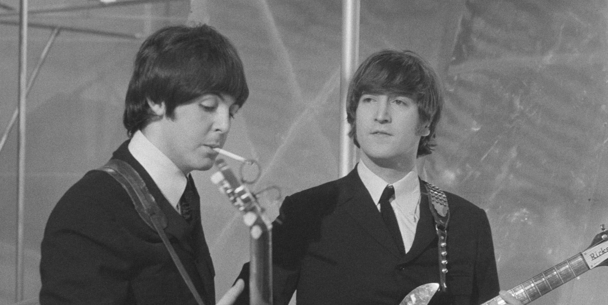 Musicians John Lennon (R) and Paul McCartney of English rock group The Beatles on the set of television special The Music of Lennon &amp;amp; McCartney at Granada Studios, Manchester, circa November 1965.
