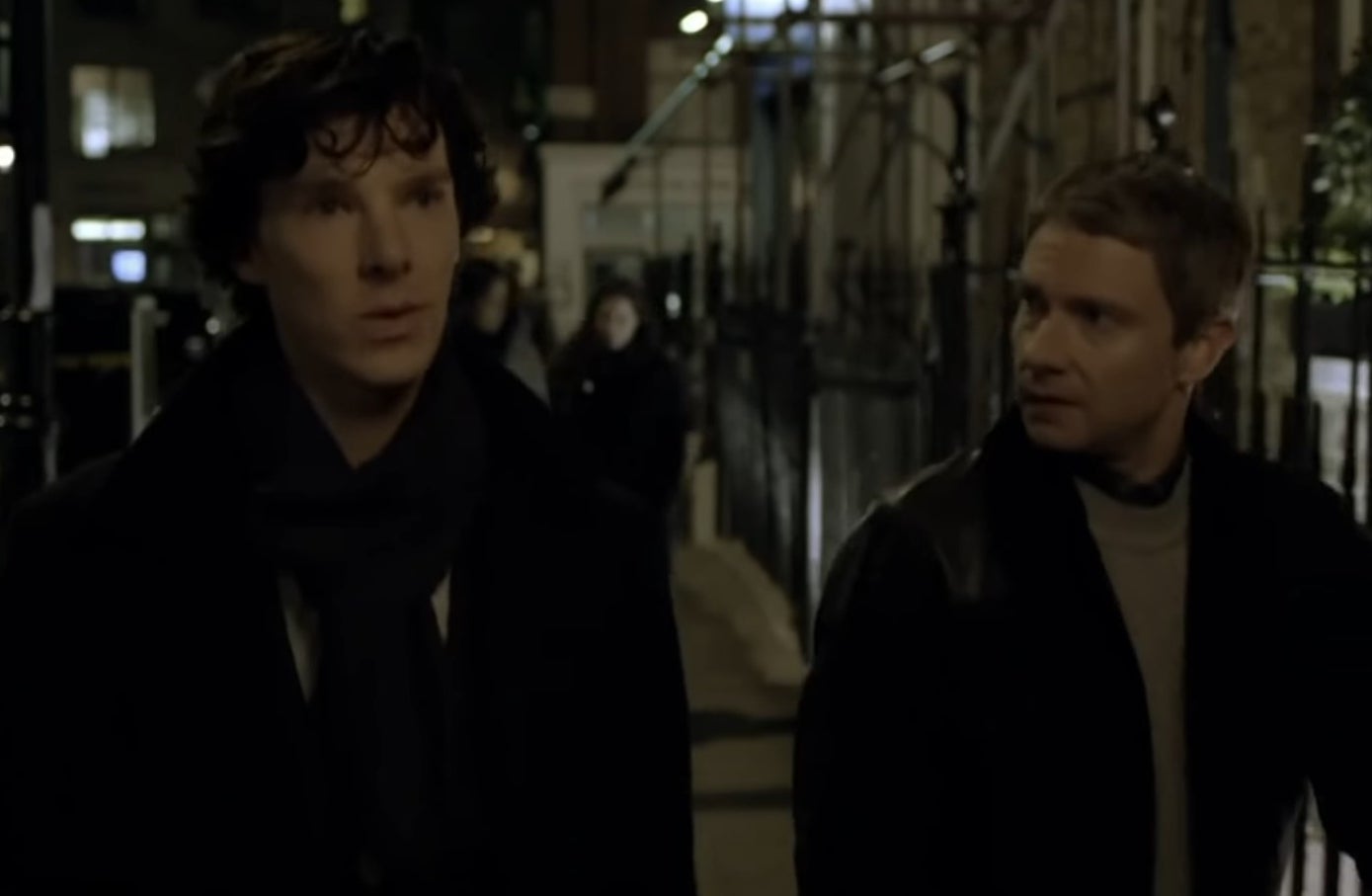 Sherlock and Watson walking down a street together at night in &quot;Sherlock&quot;