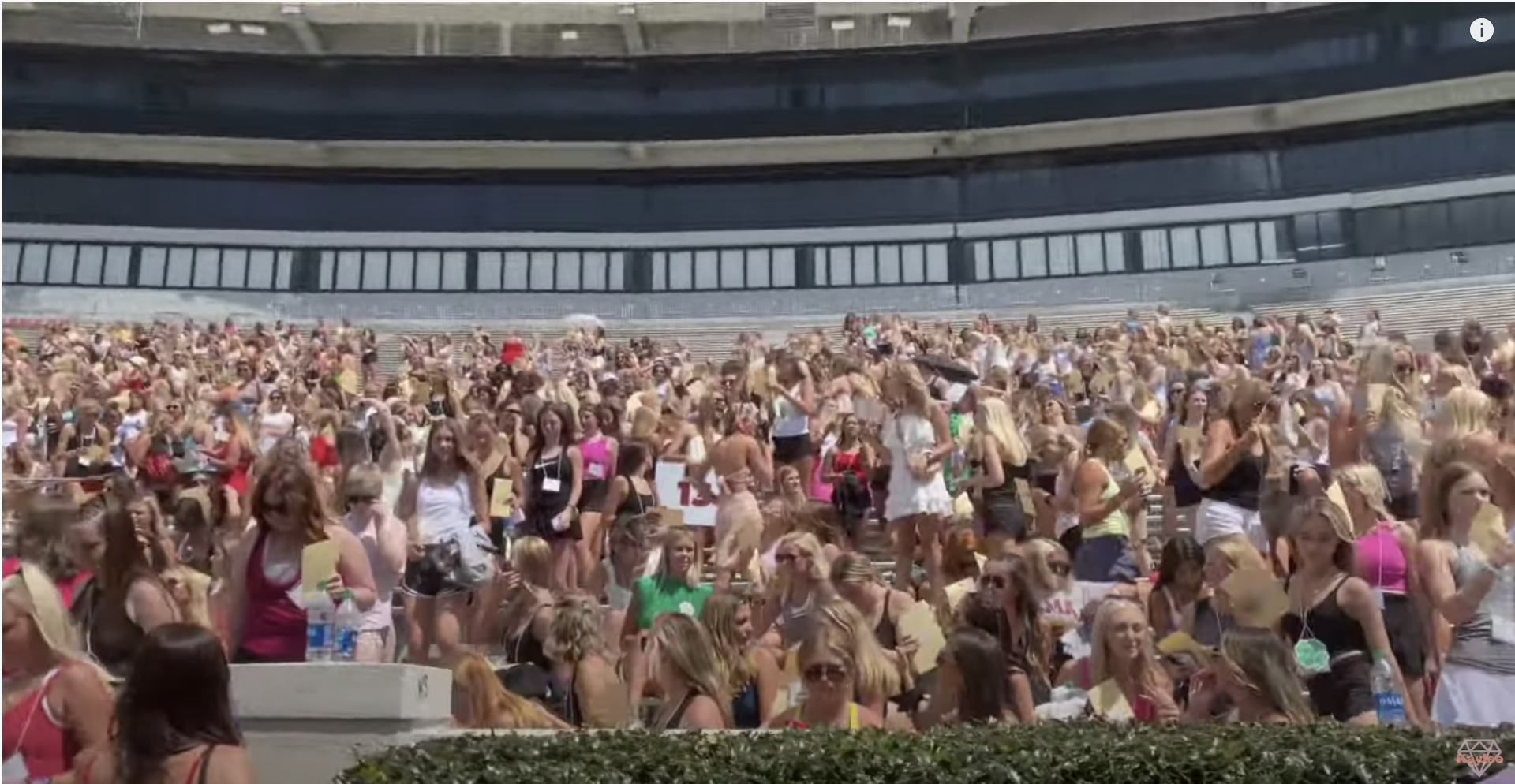 Young women waiting at a football stadium on Bid Day