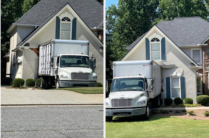 A moving truck backed up into a house